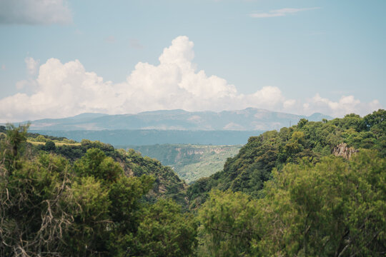 Valley and mountains in huasca de ocampo, hidalgo, mexico under a cloudy sky