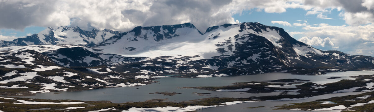 Aerial view of Sognefjellet mountain range Wide panoramic drone near Mefjell along the Fv55 route in Norway Lom Municipality