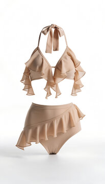 Nude Beige Halter Neck Bikini Top With A Ruffled Deep V Front And A Matching High Waisted Bikini Bottom With A Wrap Style Ruffle Overlay Floating With Body Shaped Volume On A White Background