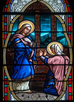Stained glass (19th century) of Visitation of the Virgin Mary to her pregnant cousin Elizabeth.