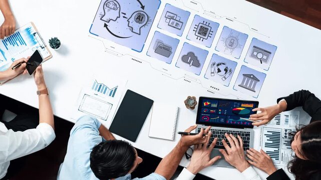 A collaborative workspace scene showcases professionals engaged in data analysis and technology discussion. Innovative tools and graphics enhance teamwork and strategy formulation. Raster