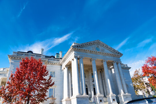 Autumn tree frames Memorial Continental Hall and its classical Washington DC portico