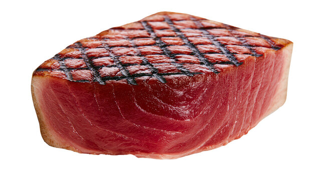 Thick grilled tuna steak with crisscross grill marks, isolated on transparent background