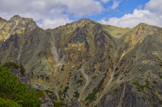 Panoramic view of steep rocky ridges and summits in the High Tatra Mountains with patches of dwarf pine (Pinus mugo).