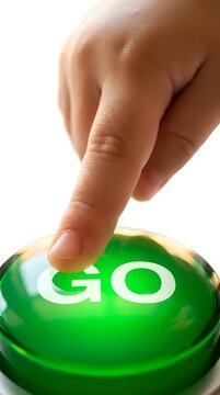 Childs hand pressing green start button with go text for business