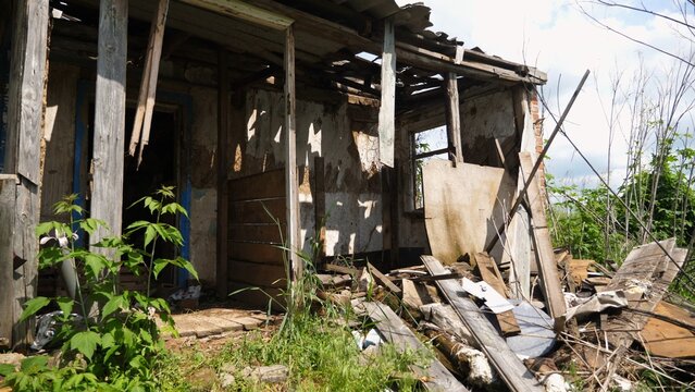 View to destroyed residential buildings at Kharkivska oblast. Ruined houses after bomb attacks on ukrainian territory from russia army. Consequences of russian invasion of Ukraine. Slow motion