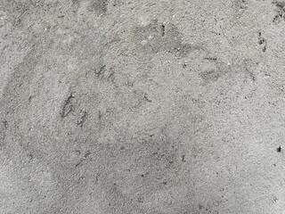 Fototapeta premium Full frame abstract texture of raw wet grey cement mixture background