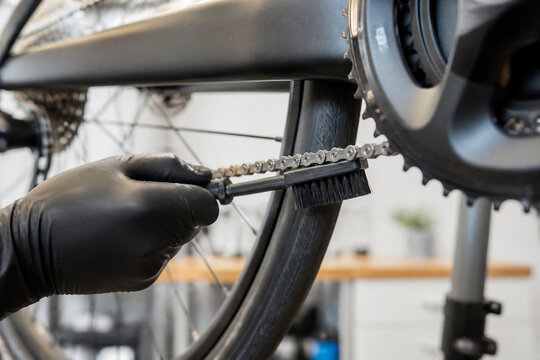 Bicycle chain cleaned with narrow maintenance brush