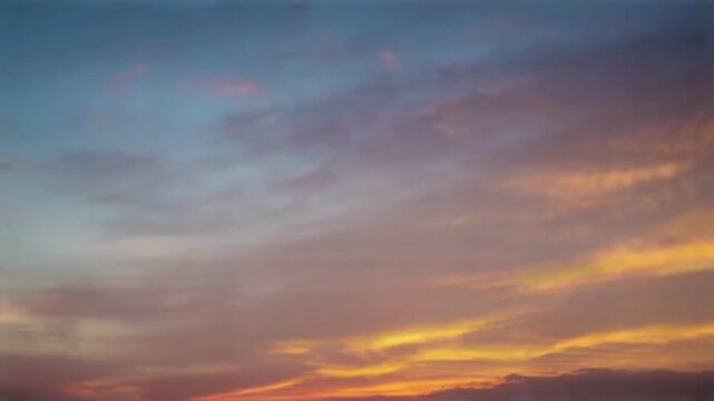 Golden Evening Horizon with Gentle Cirrocumulus Clouds Drifting Loop