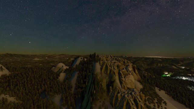 Night aerial drone view of the snow at Mount Rushmore National Memorial in Keystone. South Dakota. United States