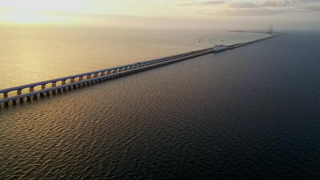 Aerial view of Progreso Pier bridge at sunrise over the ocean