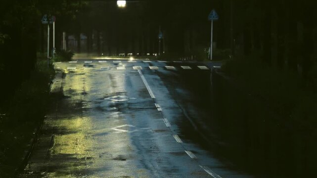 Tokyo,Japan - August 12, 2026: A car making a U-turn due to Heavy rain falling in the night