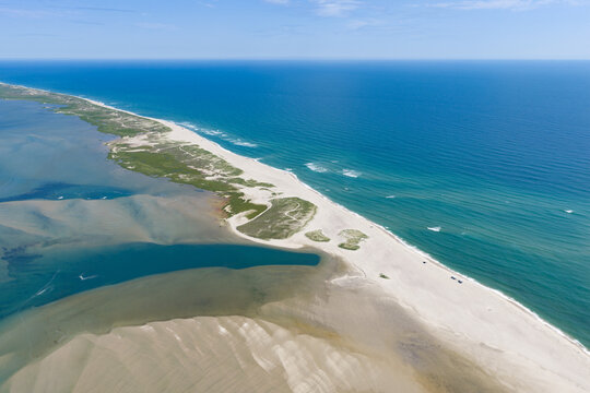 The North Atlantic Ocean washes against the beautiful coast of Orleans on Cape Cod, Massachusetts. This outer Cape is a popular east coast vacation destination during summer months.