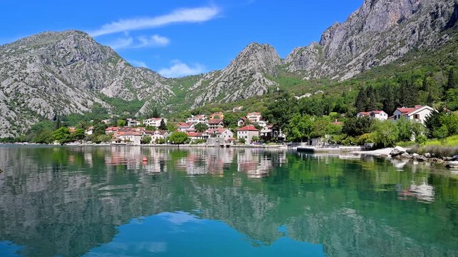Town of Orahovac with reflection in the Adriatic Sea