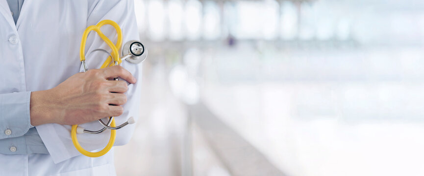 Banner Women doctor using laptop tablet telemedicine vdo call conference with patient. Banner woman doctor write prescription medical lab working medical clinic looking CAT scan film with copy space