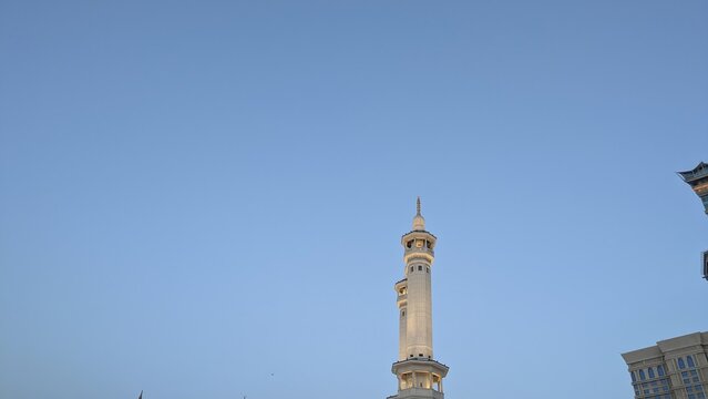 Islamic Minaret Against Clear Blue Sky.