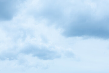 Obraz premium Soft blue fluffy clouds filling the sky for a natural background.