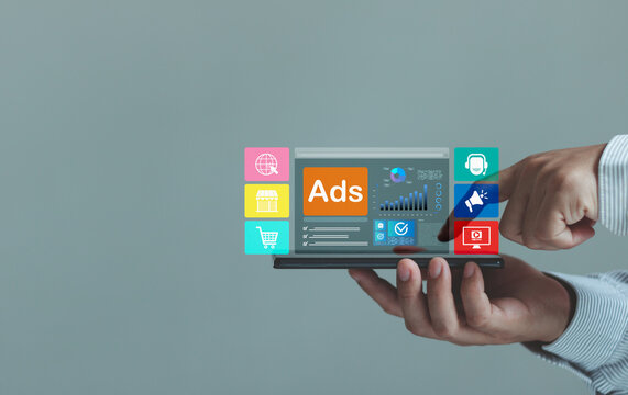 Digital advertising concept. Online ads, marketing analytics, ecommerce, customer engagement, campaign management on tablet, representing digital marketing, promotion, targeting, business growth.