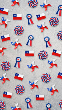 Chilean flags, cockades, and pinwheels creating a festive pattern for national celebrations
