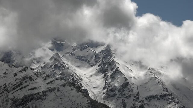 Snowy Eastern Black Sea Mountains in Rize Turkey rise above forests and cloud valleys.