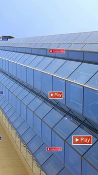 Play and subscribe buttons animation over skyscraper with reflective glass windows