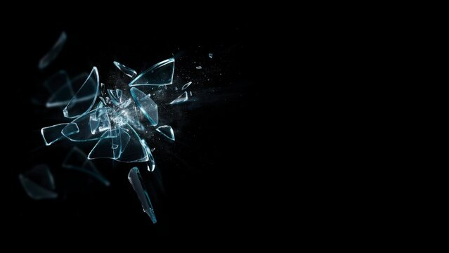 Shards of shattered glass flying against a solid black background