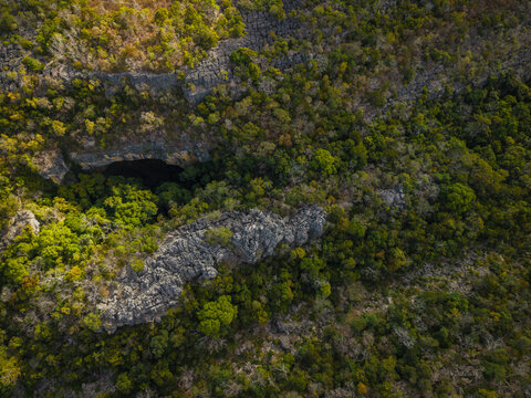 Aerial view of the rugged limestone karst formations and dense forest canopy of the Ankarana Special Reserve in Diana, Madagascar.