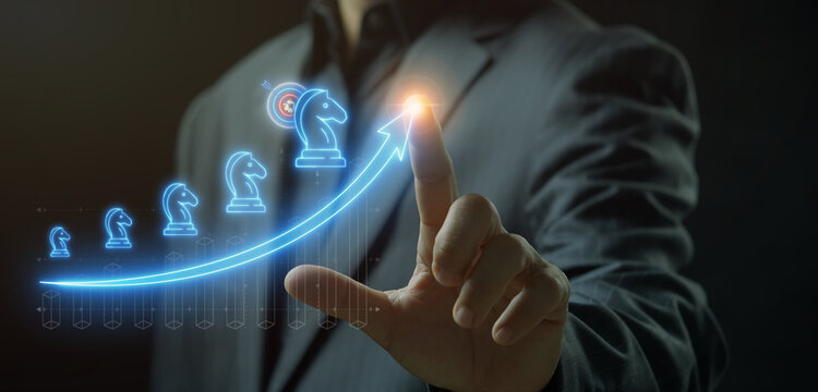 Businessman finger touching glowing growth arrow path connecting knight chess piece icons in sequence display. Strategic career progression, business development, and competitive growth concept.