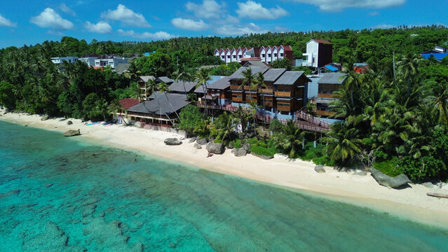 Pristine Tropical Coast with Beach Houses and Turquoise Ocean in Sabang, Aceh, Indonesia