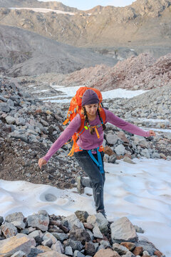 She dances through the glacial terrain