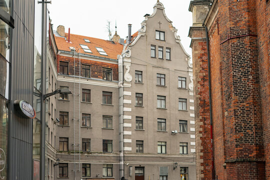 Riga, Latvia - 21 November 2019: Historic residential building at Grēcinieku Street 11 in Vecrīga, Riga. Traditional urban facade with ornate decorative details