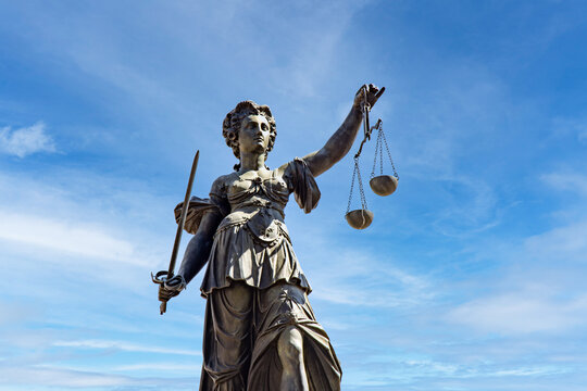 statue of lady justice - Justitia -in Frankfurt with scale and swordv