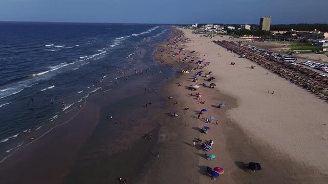 Miramar Beach Ciudad Madero Sunset Aerial View Crowded with Tourists Palapas Vehicles and Gulf of Mexico Waters