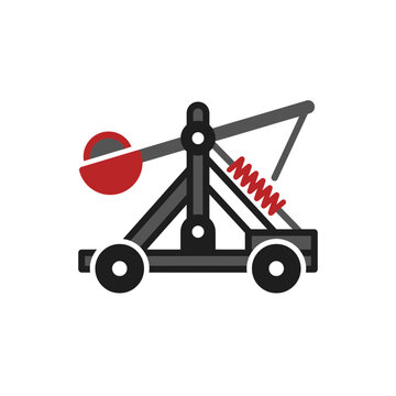 Wooden medieval trebuchet catapult with red ball.