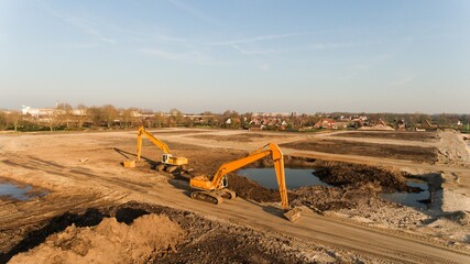 Aerial View of Excavators Working on Large Construction Site © William