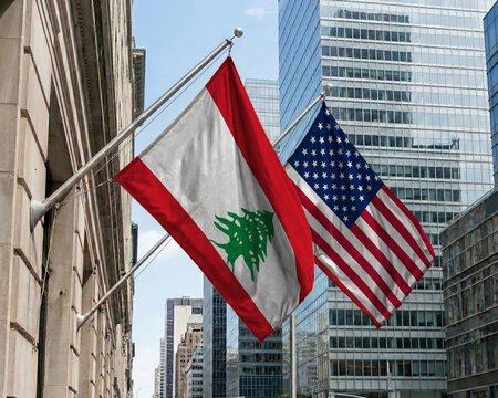 Lebanon and United States crossed national flags waving against a blue sky, representing bilateral relations and diplomacy.