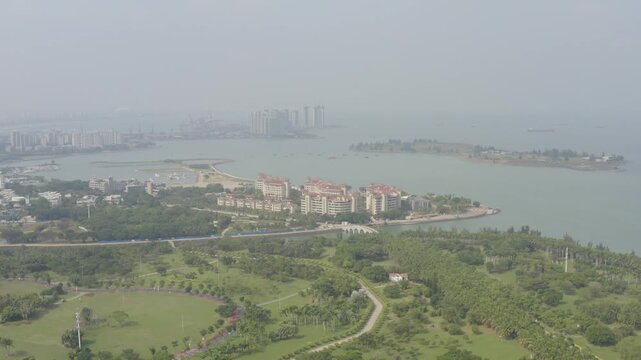 Aerial View of Waterfront Buildings and Green Spaces in Haikou