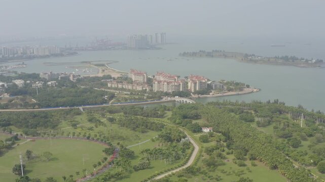 Aerial View of Waterfront Park and Residential Area in Haikou China