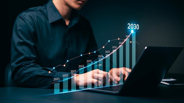 Business professional using laptop with digital growth chart and 2030 forecast