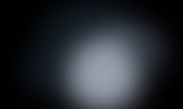 Abstract dark moody texture featuring a soft light glow on a grainy background for creative design projects