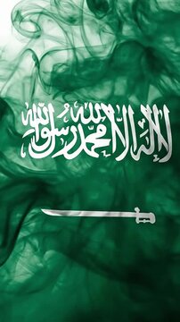 Saudi Arabia flag in smoky green background concept for national day celebrations and patriotism