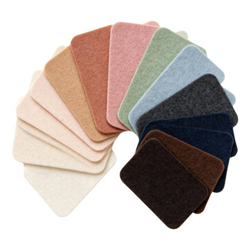 Soft felt fabric swatches in various colors arranged in fan shape showing texture and sensory appeal for design use