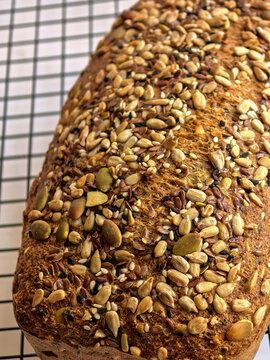 Close View Of Seeded Keto Bread On Cooling Rack