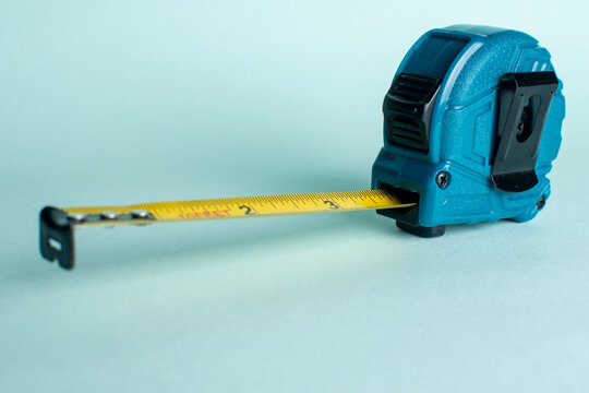 Tape measure and measuring tool representing construction repair and precision work