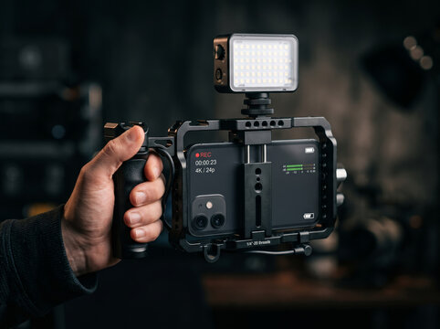 Hand Holding Portable Mobile Camera Rig with LED Light and Microphone Attached