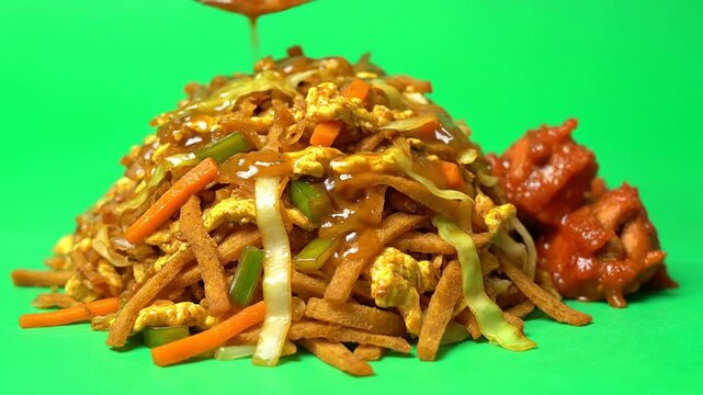Classic Sri Lankan Kottu Roti Isolated on Pure Chroma Key Green Background Perfect for Culinary Visuals