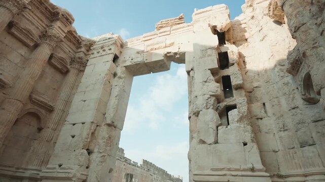 grand stone arch entrance at temple of bacchus baalbek