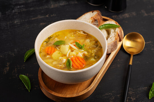 Nourishing Chicken Broth with Orzo Pasta and Fresh Basil