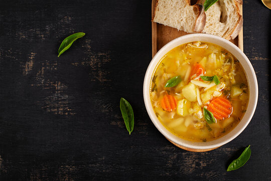 Traditional Homemade Chicken Soup with Vegetables and Orzo. Top view