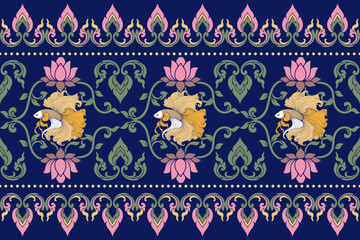 Elegant Thai betta fish floral ornamental seamless pattern with lotus and traditional decorative motifs on dark blue background. Ideal for textile, wallpaper, packaging and luxury surface design. © Noke
